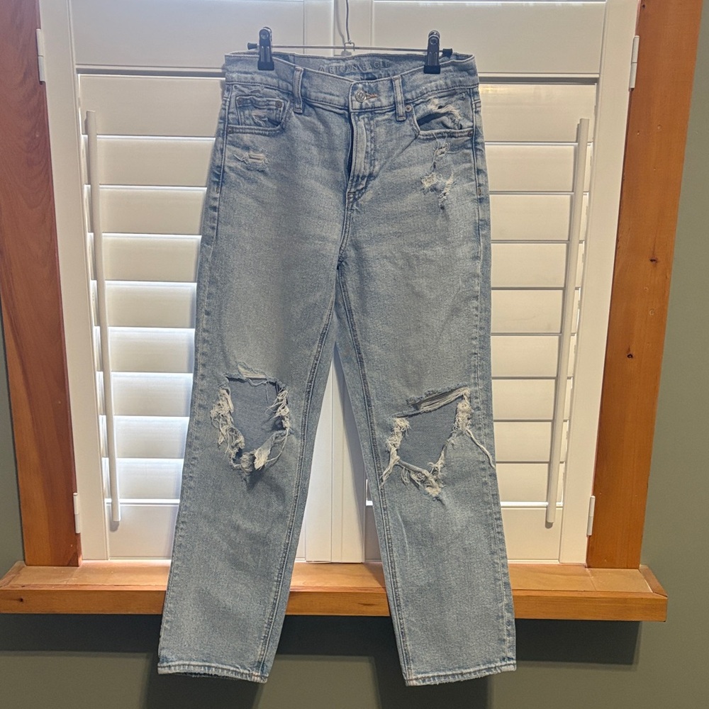 Light blue distressed jeans